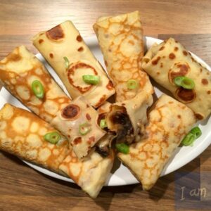 Blini with mushrooms and cheese